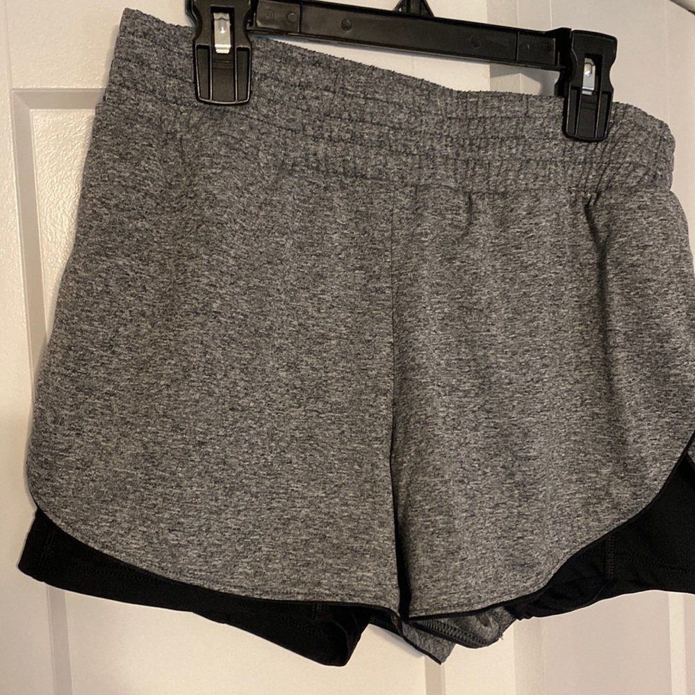 Medium athletic shorts with biker shorts underneath